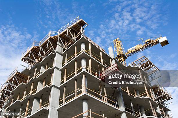 concrete highrise construction site - apartment building exterior stock pictures, royalty-free photos & images