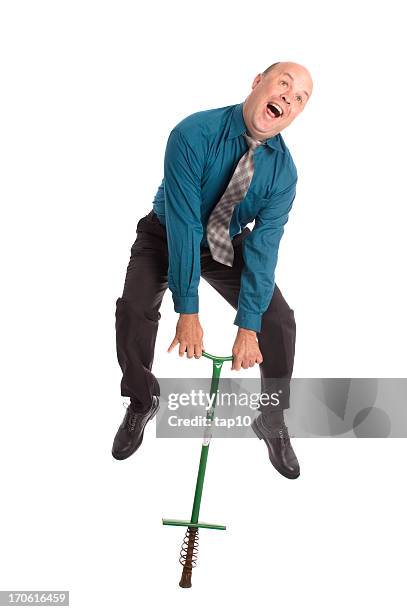 jump in business - pogo stick stock pictures, royalty-free photos & images