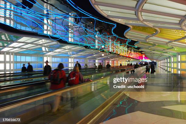 mesmerizing tunnel, chicago o'hare airport - ohare airport stock pictures, royalty-free photos & images