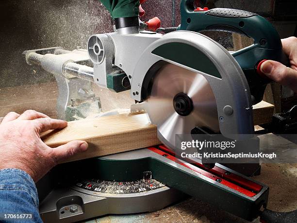carpenter series - sawing stock pictures, royalty-free photos & images
