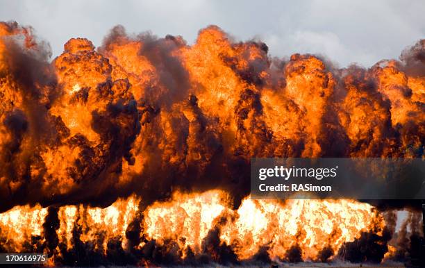 wall of fire - bomb stock pictures, royalty-free photos & images