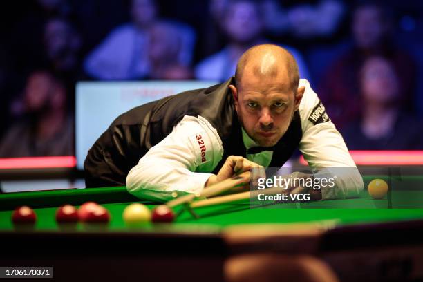 Barry Hawkins of England plays a shot in the second round match against Kyren Wilson of England on day 4 of the 2023 Cazoo British Open at the...