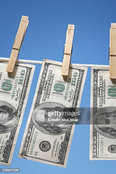 hundred dollar bills - blanqueo de dinero fotografías e imágenes de stock