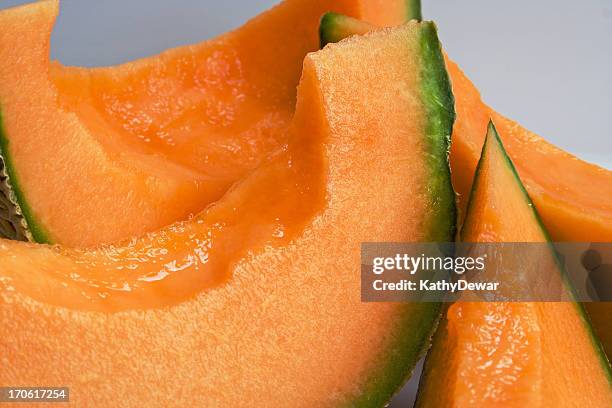 cantaloupe slices - cantaloupe stock pictures, royalty-free photos & images