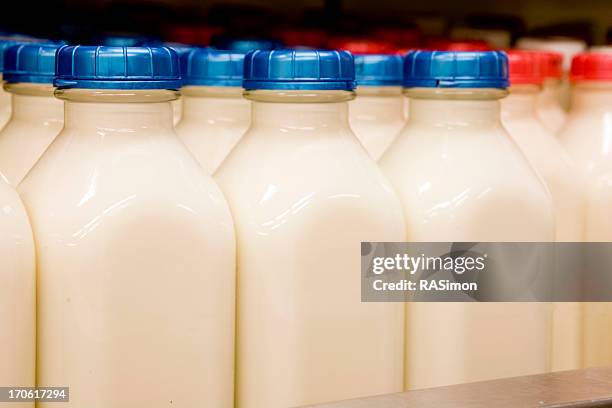 milk in glass bottles - milk bottles stock pictures, royalty-free photos & images