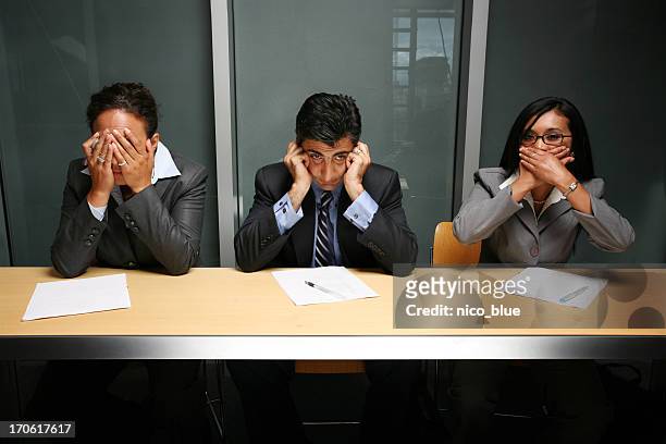 see, hear, speak no evil - hear no evil stock pictures, royalty-free photos & images