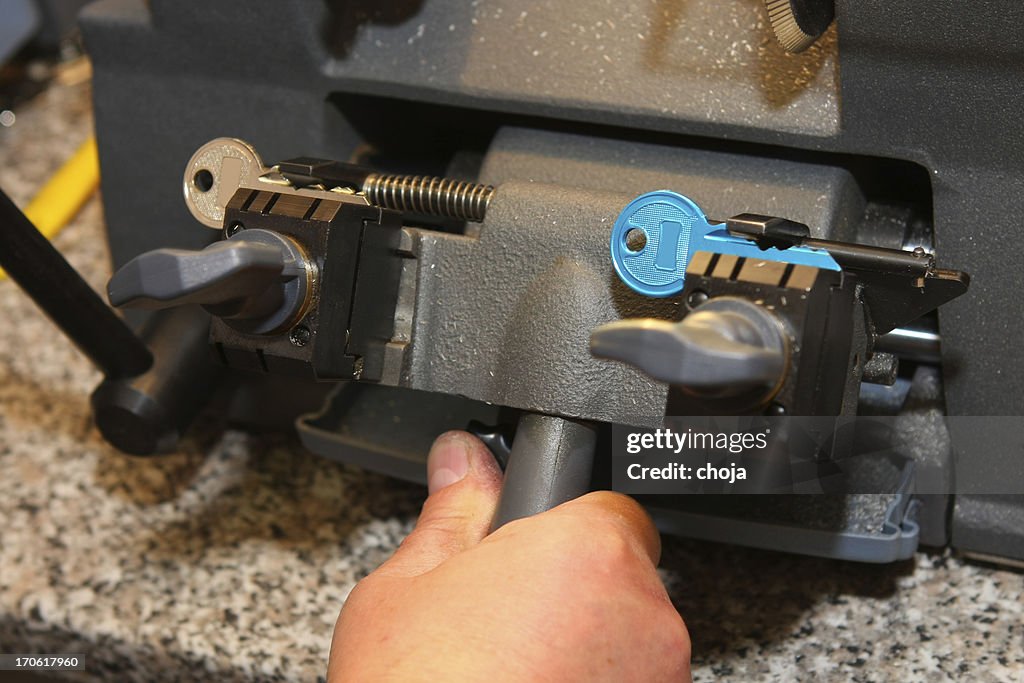 Locksmith at work....making spare key