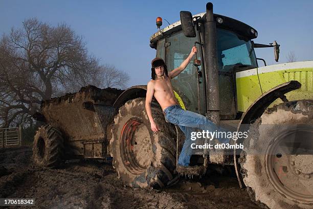 farmer boy - tractor tyre stock pictures, royalty-free photos & images