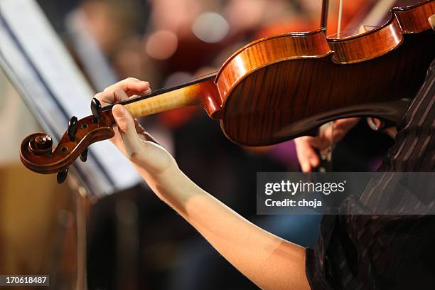 musicians playing in concert....violinist - musical instrument string stock pictures, royalty-free photos & images