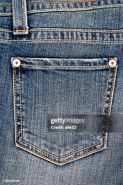 closeup of a jean pocket laying unworn - jean pocket stock pictures, royalty-free photos & images