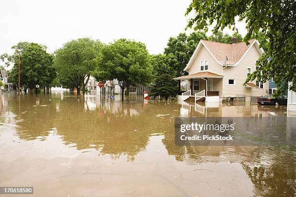 flooding in the midwest - united states house stockfoto's en -beelden
