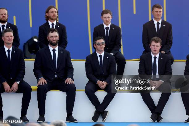 Team Europe look on from the stage during the opening ceremony for the 2023 Ryder Cup at Marco Simone Golf Club on September 28, 2023 in Rome, Italy.