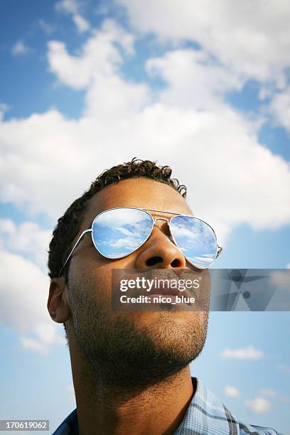 blue skies - mirrored sunglasses stockfoto's en -beelden
