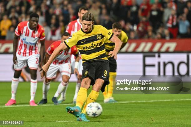 Young Boys' Swiss forward Cedric Itten shoots from the penalty spot to score his team's second goal during the UEFA Champions League 1st round day 2...