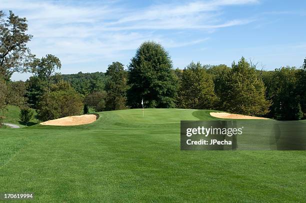 lush green fairway looking towards the green on a sunny day - golfbana bildbanksfoton och bilder