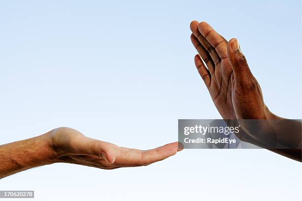 black-white low five - post apartheid stock pictures, royalty-free photos & images