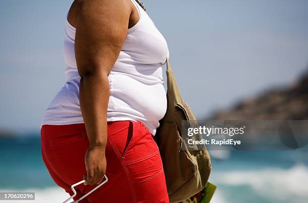 fat woman at the beach - female backside stock pictures, royalty-free photos & images