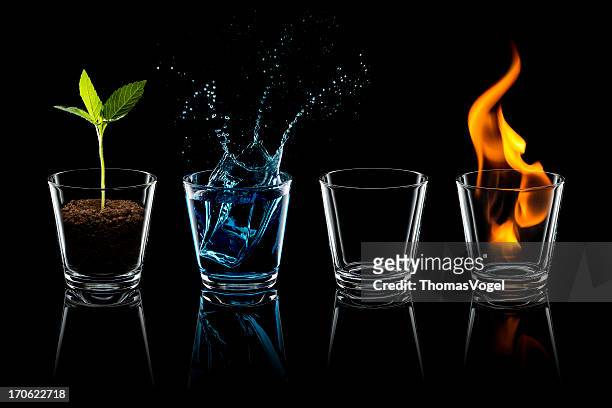 classical element - earth water air fire glass four - fire transparent stock pictures, royalty-free photos & images