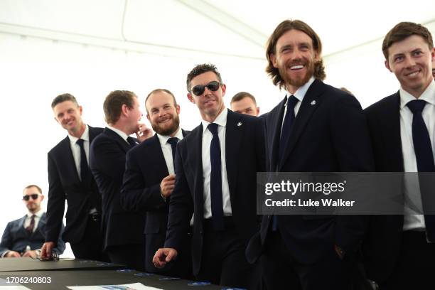 Rory McIlroy of Team Europe and teammates prepare to walk on stage ahead of the opening ceremony for the 2023 Ryder Cup at Marco Simone Golf Club on...