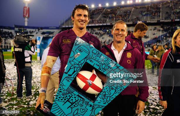 England captain Tom Wood and coach Stuart Lancaster with the trophy after the second test match between Argentina and England at the Stadium Velez...