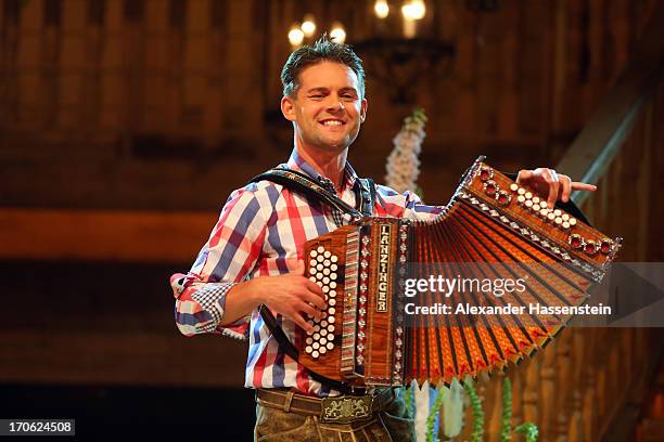 Florian Fesl performes at the rehearsal for the Musikantenstadl presented by Austrian host Andy Borg at Saturn Arena on June 14, 2013 in Ingolstadt,...