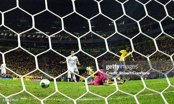 Jo of Brazil scores his team's third goal past Eiji Kawashima of Japan during the FIFA Confederations Cup Brazil 2013 Group A match between Brazil...