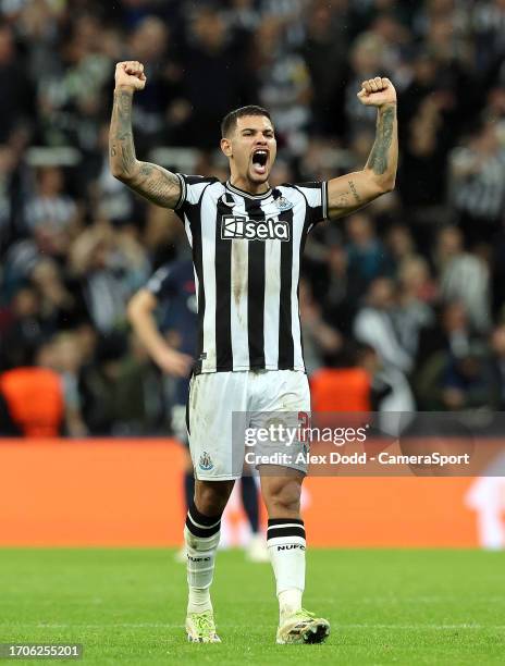 Newcastle United's Bruno Guimaraes celebrates his side's fourth goal scored by Fabian Schar during the UEFA Champions League match between Newcastle...