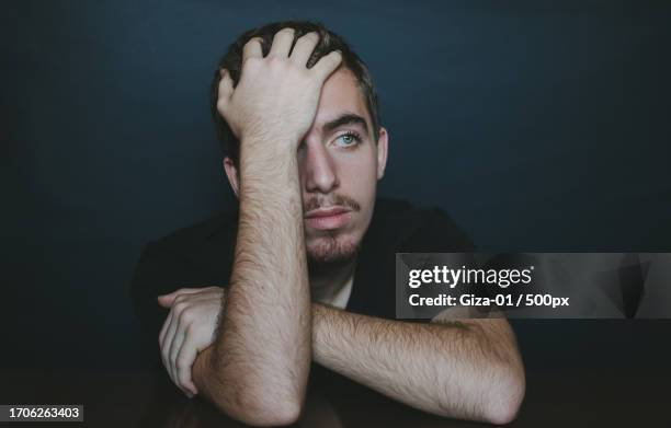 Resting Head 1,875 Man Resting Head On Hands Stock Photos, High-Res Pictures, and ...
