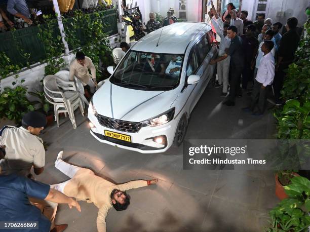 Workers protesting during AAP Rajya Sabha MP Sanjay Singh being arrested by the Enforcement Directorate in connection with the Delhi excise policy...