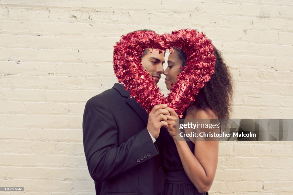 Boy and girl with a valentine heart