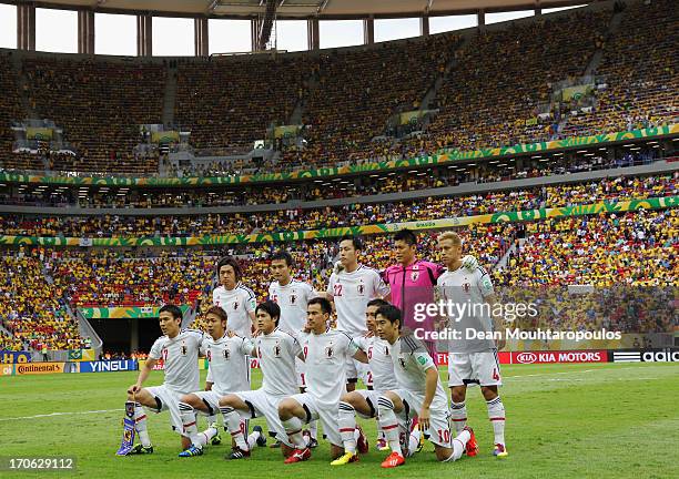 The Japan players line up for a team photo prior to the FIFA Confederations Cup Brazil 2013 Group A match between Brazil and Japan at National...