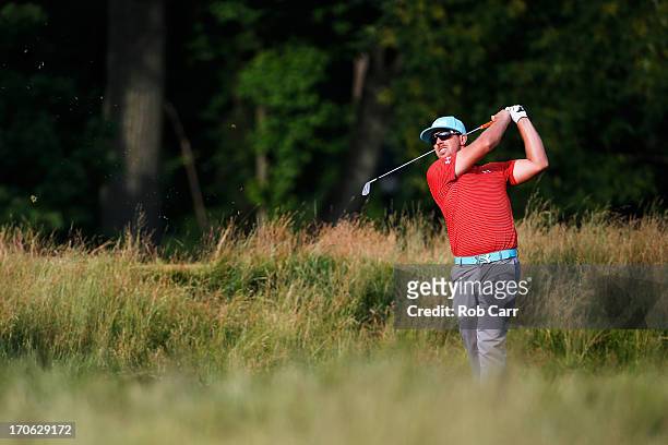 Hunter Mahan of the United States hits his second shot on the 14th hole during Round Three of the 113th U.S. Open at Merion Golf Club on June 15,...