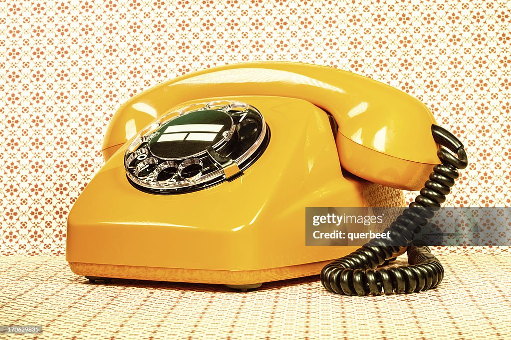 Retro orange telephone