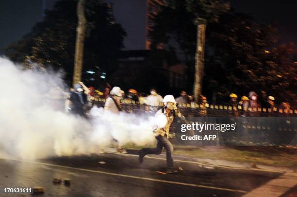 Protesters clash with Turkish police near Gezi Park in Istanbul June 15, 2013. Turkish police stormed an Istanbul park on Saturday after protesters...