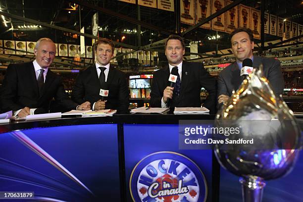 Hockey Night in Canada sportscasters Ron MacLean, P.J. Stock, Kelly Hrudey and Elliotte Friedman pose at the CBC news desk before Game Two of the...