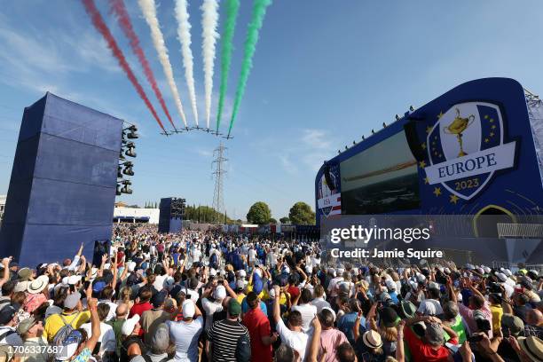 The Frecce Tricolori perform a display over the crowd and stage during the opening ceremony for the 2023 Ryder Cup at Marco Simone Golf Club on...