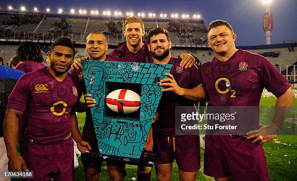England players from left to right, Kyle Eastmond, Jonathan Joseph, Dave Attwood, Rob Webber and David Wilson celebrate after the second test match...