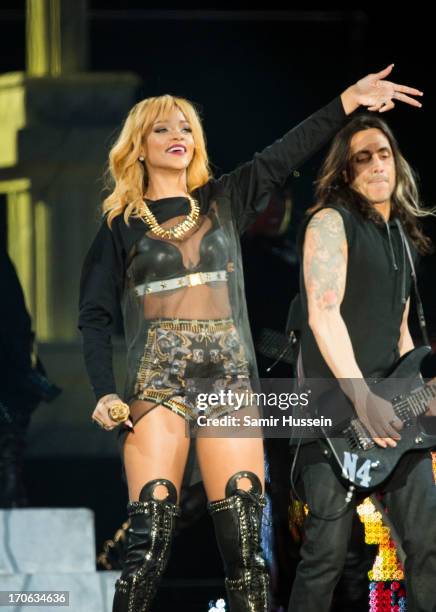 Rihanna performs live on stage at Twickenham Stadium on June 15, 2013 in London, England.