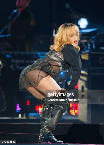 Rihanna performs live on stage at Twickenham Stadium on June 15, 2013 in London, England.