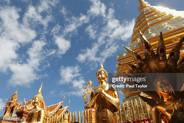 gold statuary at doi suthep temple - doi suthep stock pictures, royalty-free photos & images