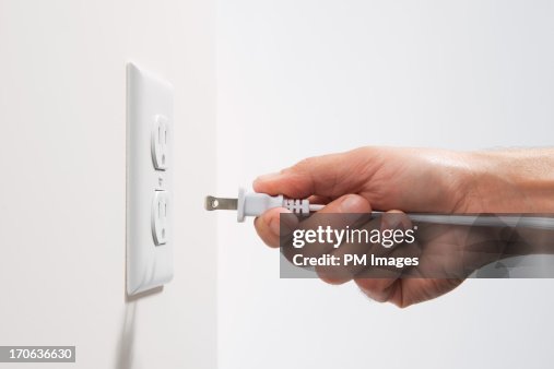 Man Plugged In Man About To Plug In High-Res Stock Photo - Getty Images