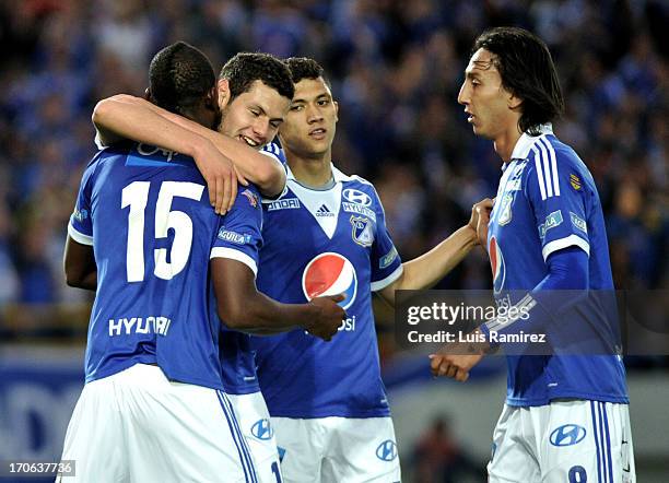 The players of Millonarios celebrate a scored goal during the match between Millonarios and Once Caldas as part of Postobon Leguaje 2013 at Nemesio...