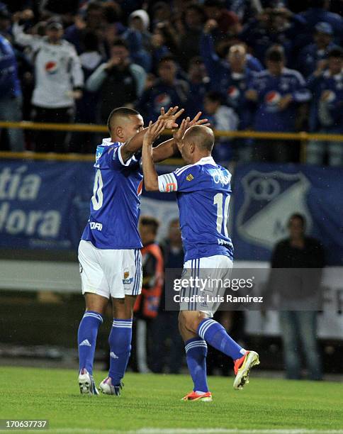 The players of Millonarios celebrate a scored goal during the match between Millonarios and Once Caldas as part of Postobon Leguaje 2013 at Nemesio...