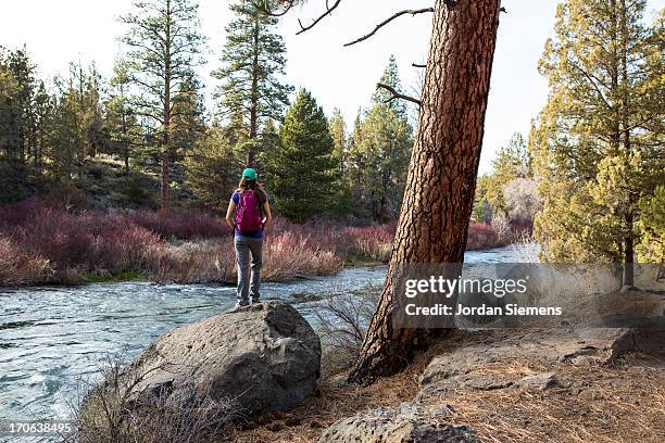 a female on a day hike. - bend oregon fotografías e imágenes de stock