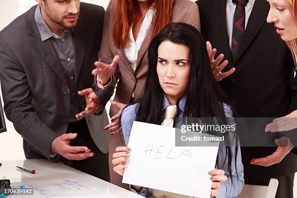 mobbing with help me sign - overcrowded office meeting room stock pictures, royalty-free photos & images