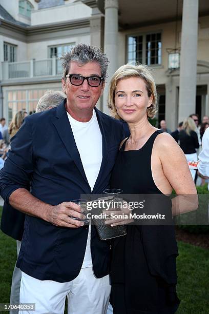 Andrew Rosen and Jenny Dyer attend "Midsummer Night Drinks" Benefiting God's Love We Deliver at Villa Maria on June 15, 2013 in Water Mill, New York.