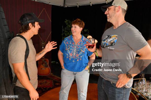 Charlie Worsham, BV Wine Educator Tia Butts and BV Winemaker Trevor Durling seen at Day 2 of Pilgrimage Music & Cultural Festival 2023, sponsored by...