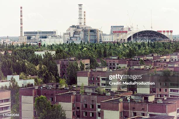 chernobyl nuclear reactor and pripyat ghost town - chernobyl stockfoto's en -beelden