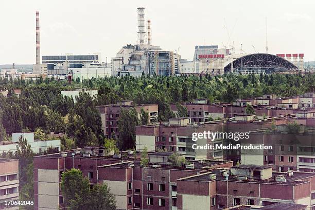 chernobyl nuclear reactor and pripyat ghost town - chernobyl 1986 stock pictures, royalty-free photos & images