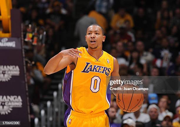 Andrew Goudelock of the Los Angeles Lakers brings the ball up court during the game between the Utah Jazz and the Los Angeles Lakers at Staples...